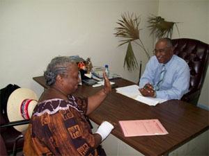 Premier of Nevis, Hon. Joseph Parry and a visitor to his one on one Wednesday sessions.